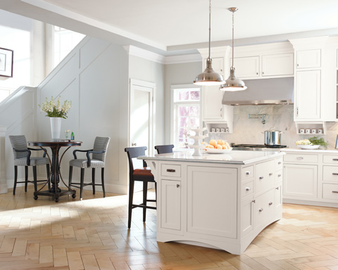 White contemporary kitchen with hardwood flooring